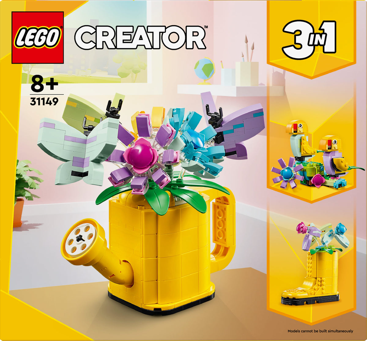 FLOWERS IN WATERING CAN