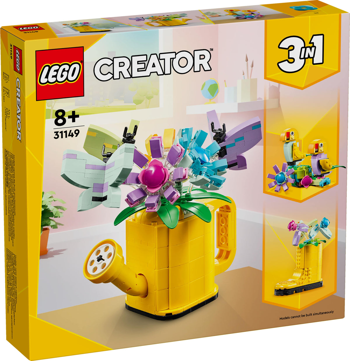 FLOWERS IN WATERING CAN